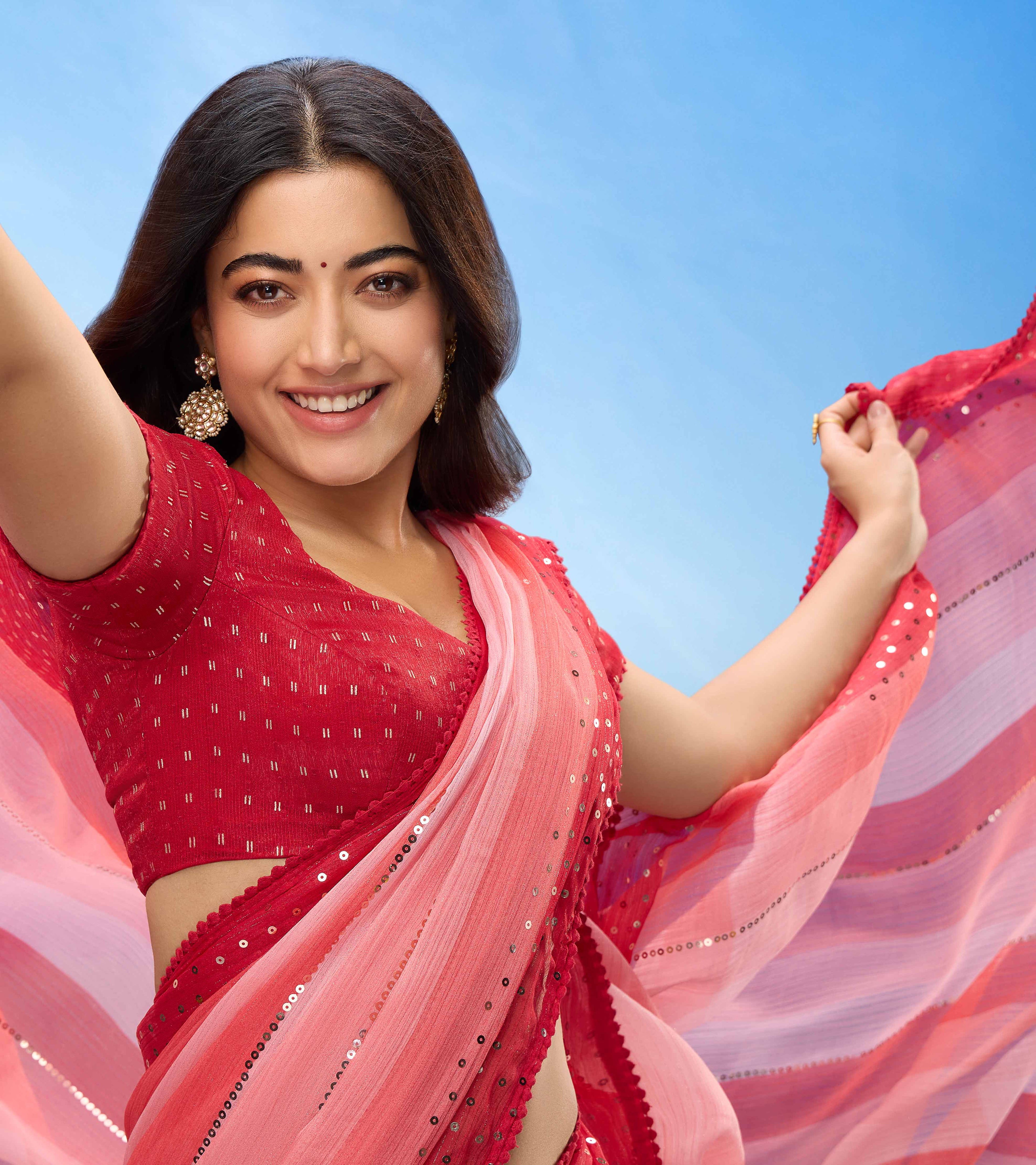 Rashmika for Laxmipati Striped Printed Chiffon Saree in Coral Color with Unstitched Blouse