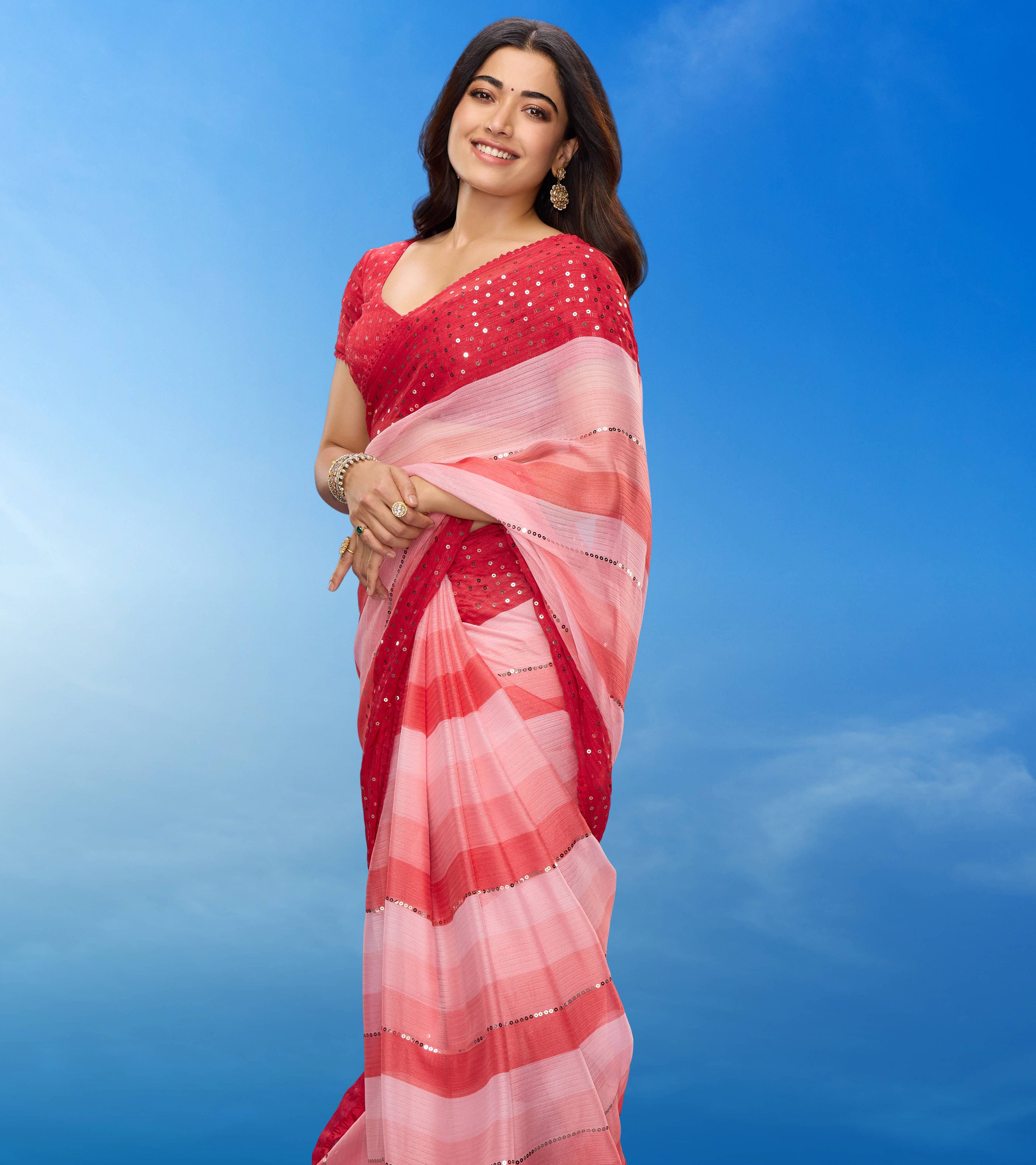 Rashmika for Laxmipati Striped Printed Chiffon Saree in Coral Color with Unstitched Blouse